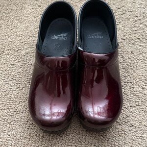 Dansko Dark Red Patent Leather Clogs